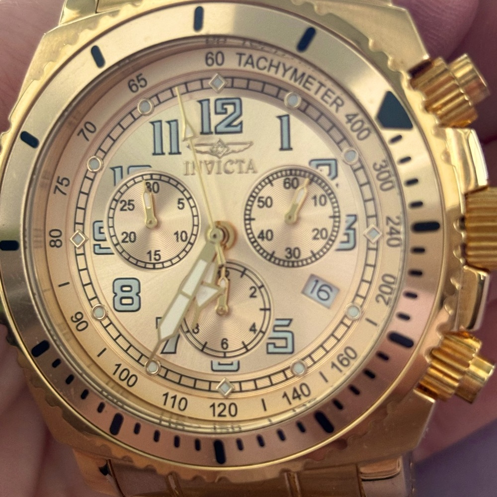 Men’s gold Invicta watch